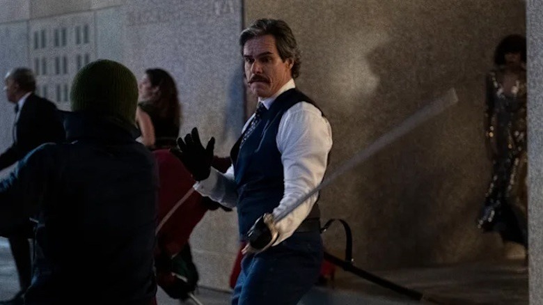 Tony Dalton as Jack Duquene/Swordsman fighting off foes in Hawkeye