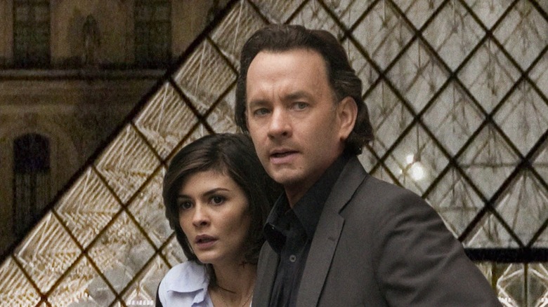 Tom Hanks as Robert Langdon and Audrey Tautou as Sophie Neveu in The Da Vinci Code.