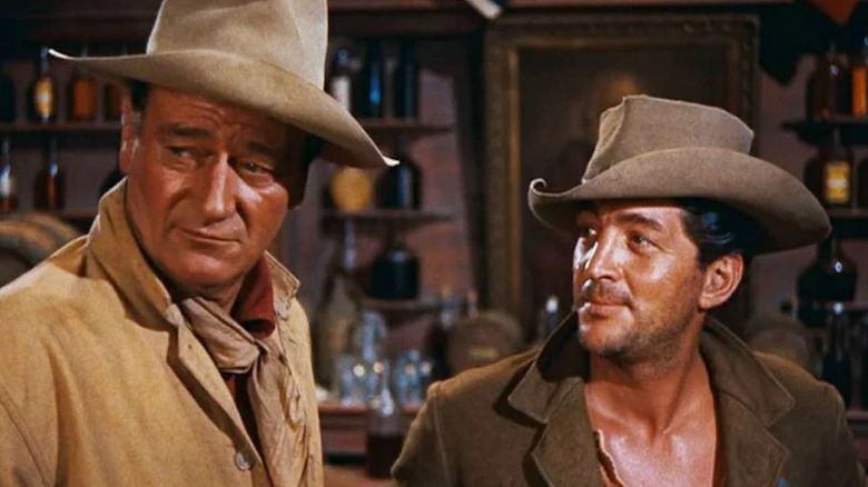 Dude (Dean Martin) glances approvingly at John T. Chance (John Wayne) in Rio Bravo