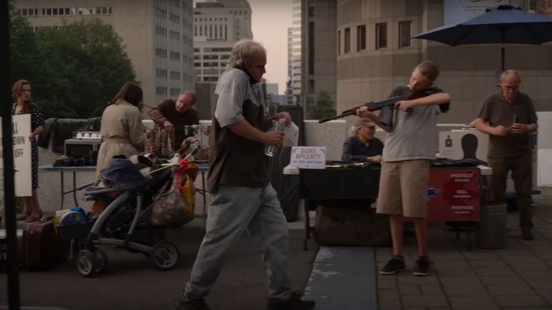 Beau walking among street vendors