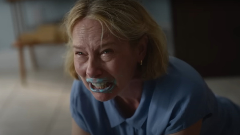 Grace screaming with paint on her mouth
