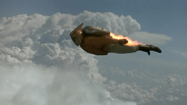 The Rocketeer (Bill Campbell) rides his jetpack in the sky in The Rocketeer