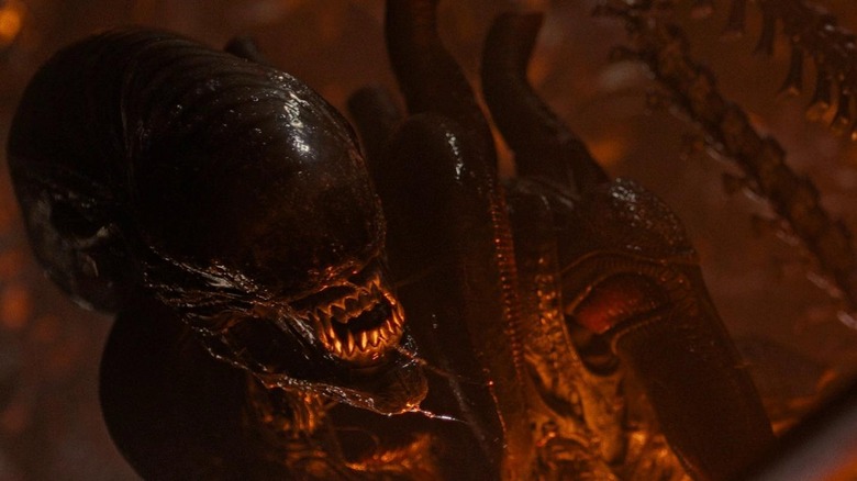 Xenomorph crawling in Alien: Romulus