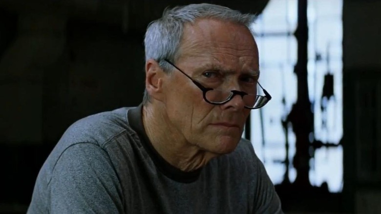 Clint Eastwood as Frankie Dunn in Million Dollar Baby, looking grumpily over at something out of frame.