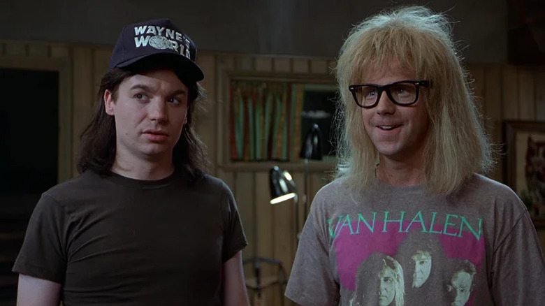 Wayne Campbell (Mike Myers) and Garth Algar (Dana Carvey) stand together in their basement in Wayne's World