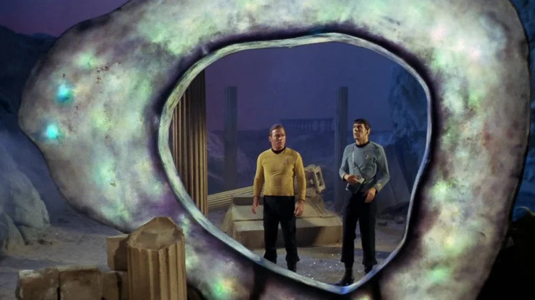 Jim Kirk (William Shatner) and Spock (Leonard Nimoy) stand by the Guardian of Forever in Star Trek: The Original Series