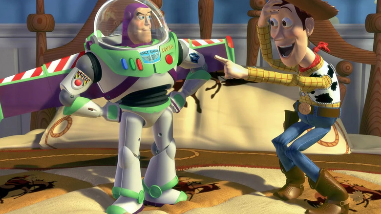 Tim Allen as Buzz Lightyear frowns at Tom Hanks as Woody in Toy Story