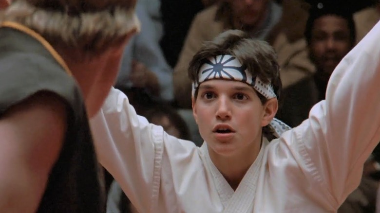 Ralph Macchio as Daniel LaRusso faces William Zabka as Johnny Lawrence in The Karate Kid