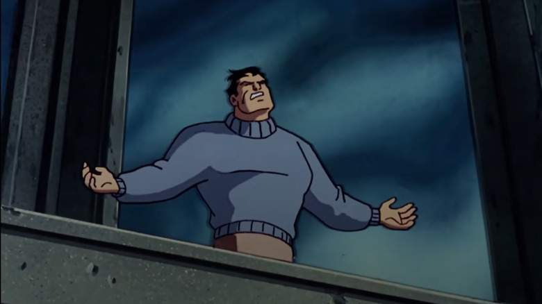 Bruce Wayne screaming atop building