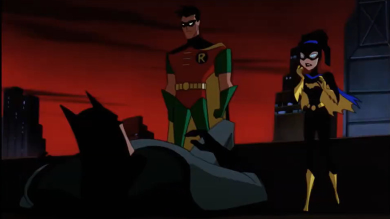 Robin looking down at Batman
