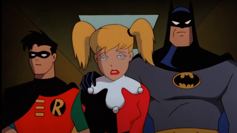 Batman & Robin escorting Harley Quinn