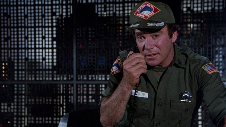 Buck Murdock (William Shatner) gets on a command center radio in Airplane II: The Sequel