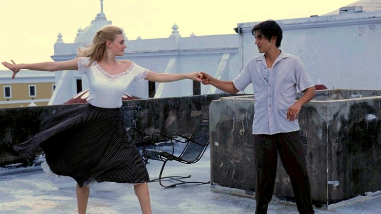 Katey Miller (Romola Garai) dances with Javier Suarez (Diego Luna) on a rooftop in Dirty Dancing: Havana Nights