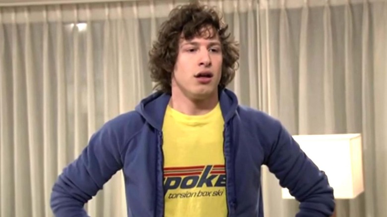 Andy Samberg looking stressed in a hotel room in a pre-taped sketch on SNL