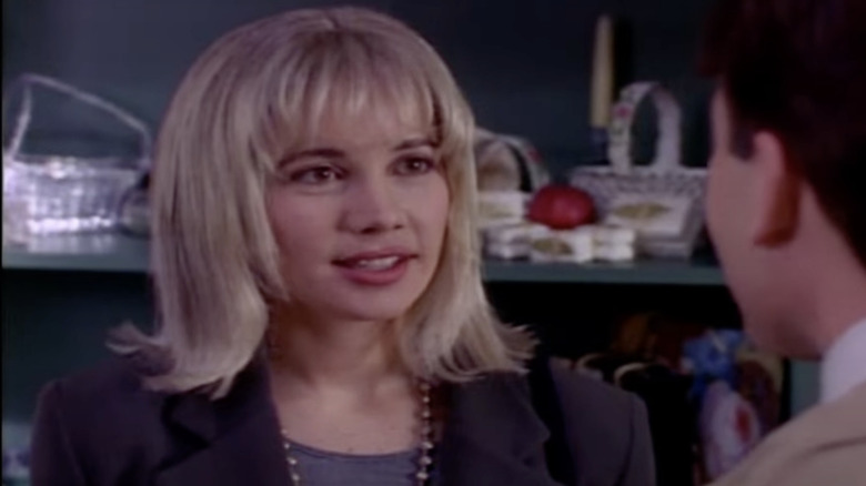 Janeane Garofalo wearing a blonde wig in a pre-taped sketch from SNL