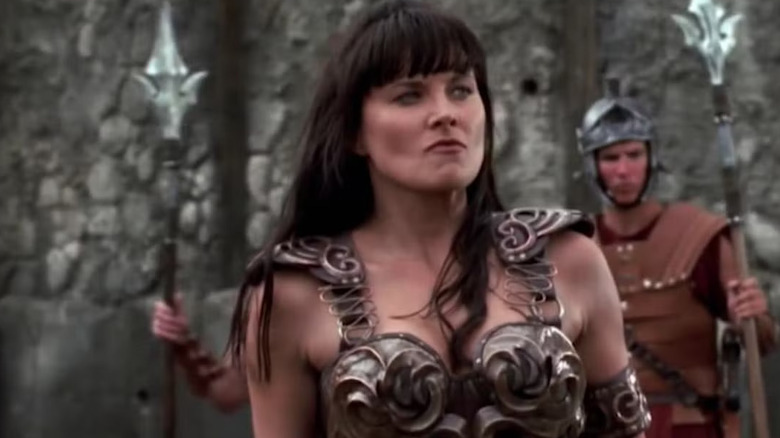 Lucy Lawless as Xena looks angry in Xena: Warrior Princess