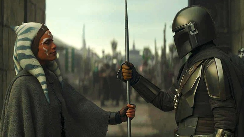 Ahsoka gifting Din Djarin a spear