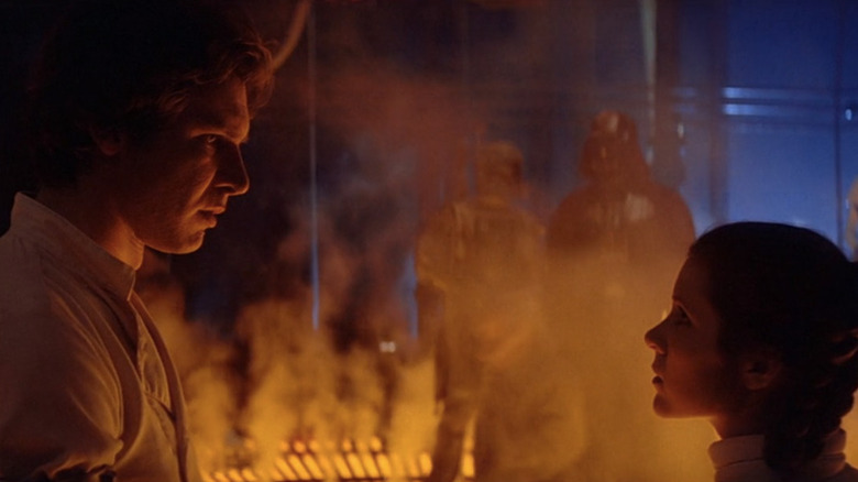 Han Solo and Leia looking at each other
