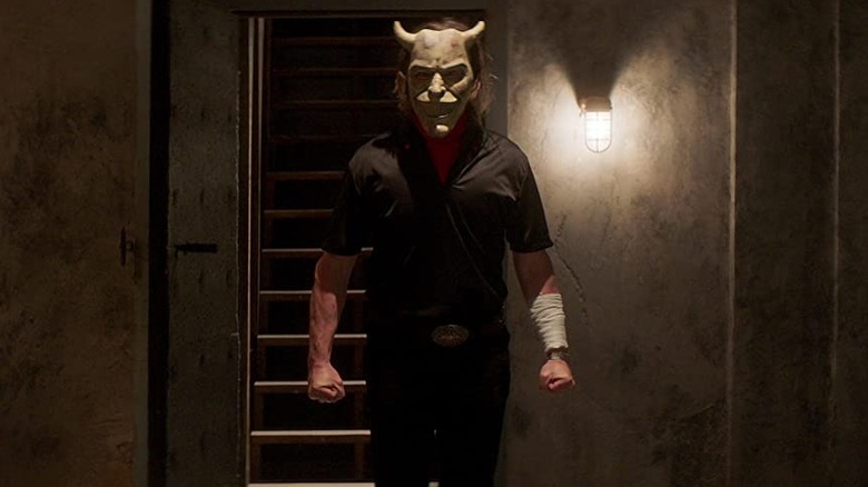 Ethan Hawke wearing horror mask The Black Phone