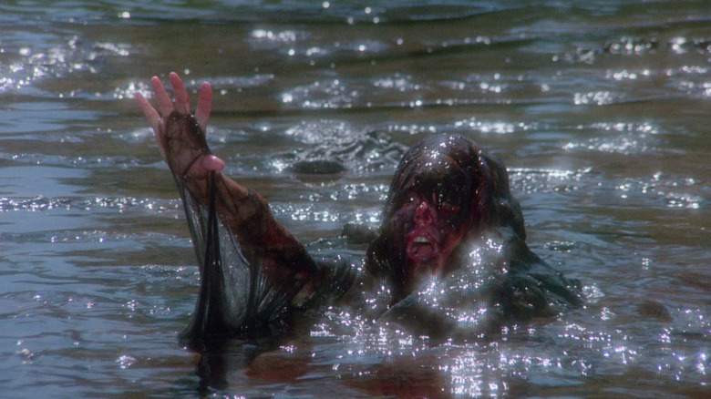 Woman in water monster slime The Raft