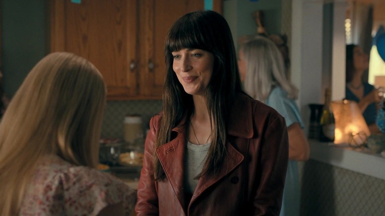 Dakota Johnson's Cassandra Webb smiling in Madame Web