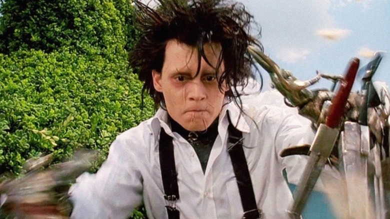Johnny Depp Edward Scissorhands trims hedges