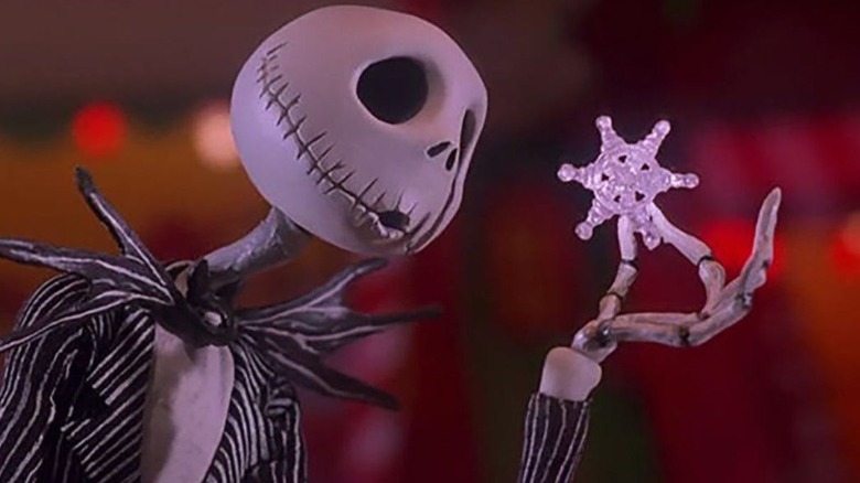 Jack Skellington Nightmare Before Christmas holds decoration