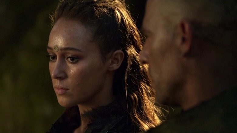 Alycia Debnam-Carey as Lexa staring into the distance on The 100
