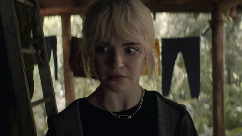 Sophie Thatcher as Natalie looking scared in Yellowjackets