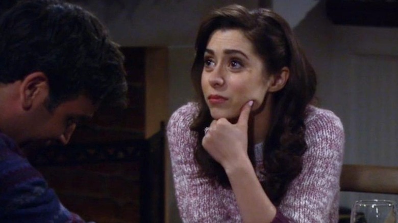 Cristin Milioti as Tracy leaning over to Josh Radnor as Ted in How I Met Your Mother