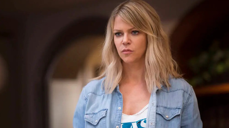 An annoyed Mickey Molng (Kaitlin Olson) stands outside in The Mick
