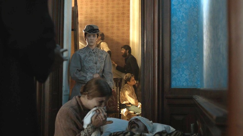 Mary Phinney (Mary Elizabeth Winstead) looking into hospital ward on Mercy Street