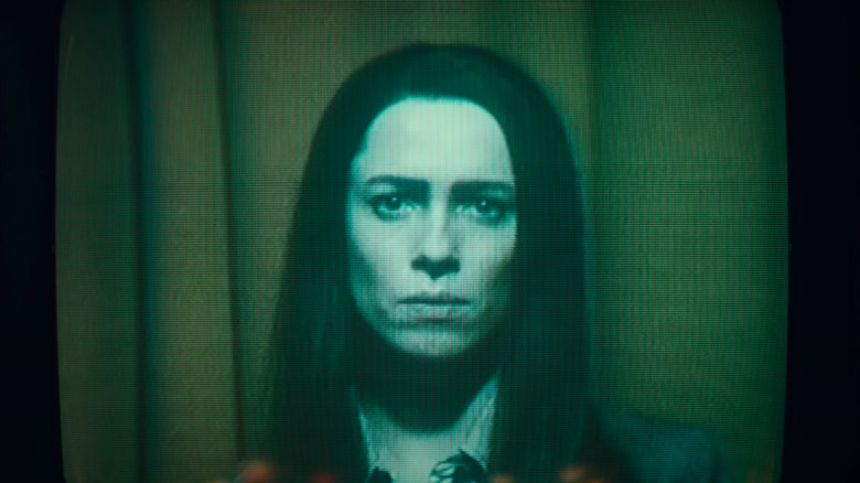 Rebecca Hall on video monitor