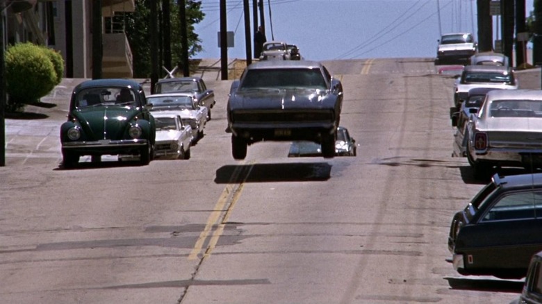 Car gliding down street