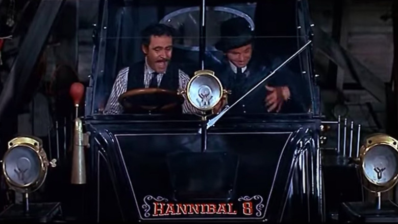 Maximillian Mean and Professor Fate in a car