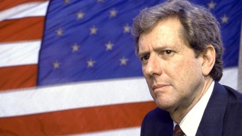 Jack Tanner seen from under a glass table
