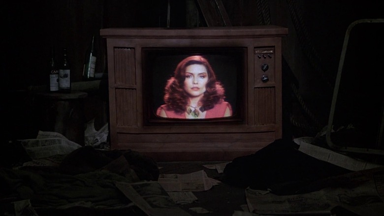 Videodrome's Nicki Brand appearing on TV screen