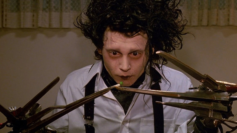 Edward shows off his scissorhands