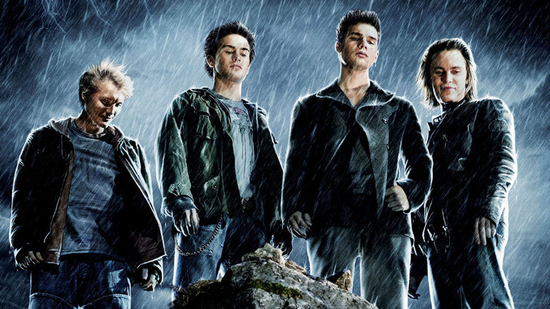 The Covenant boys by a cliff