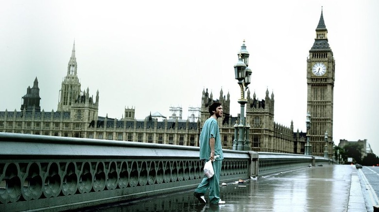 Cillian Murphy walks through deserted London
