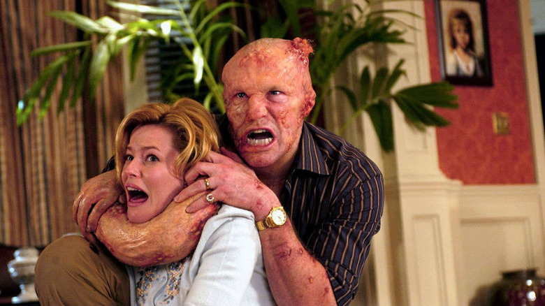 Monster Michael Rooker grabs Elizabeth Banks