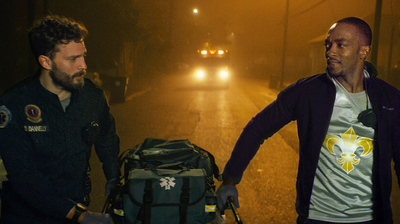 Anthony Mackie and Jamie Dornan transport body