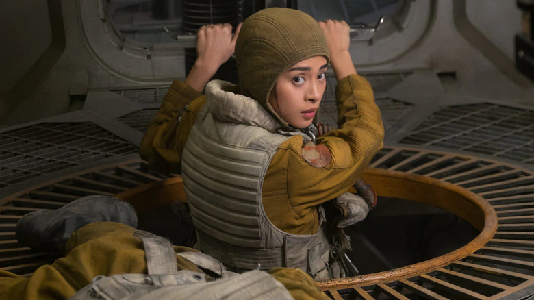 Paige Tico climbing a ladder