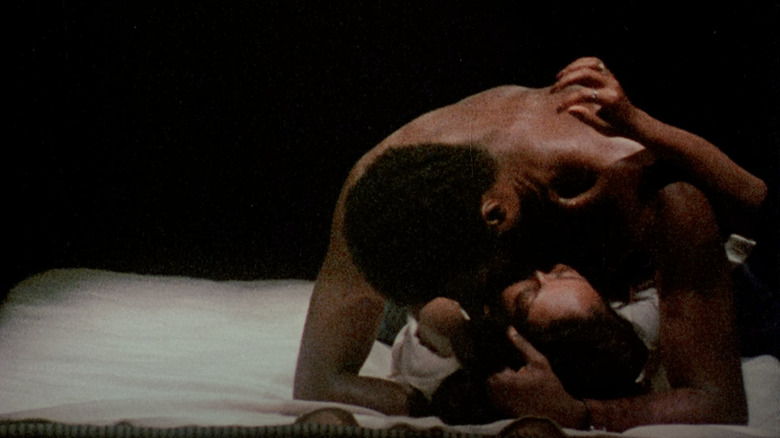 Ganja & Hess vampires kissing