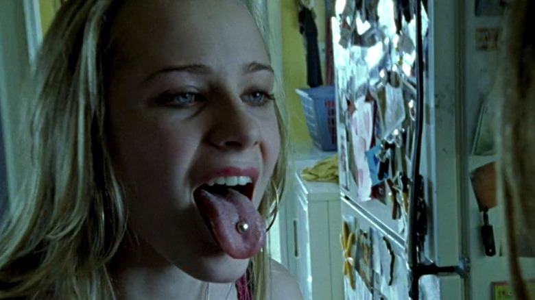Evan Rachel Wood sticking out pierced tongue in Thirteen