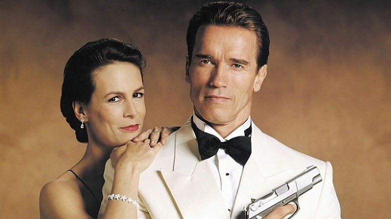 Arnie and Jamie Lee Curtis do their best superspy poses