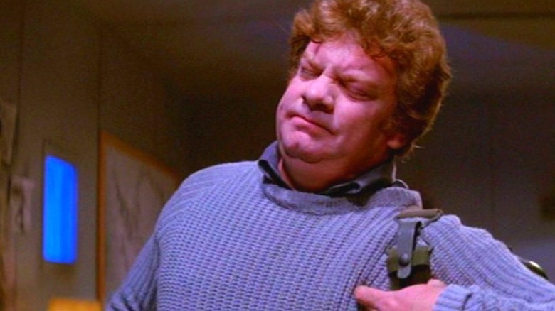 Vance winces in discomfort