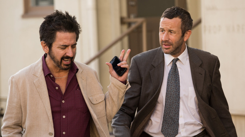 Ray Romano and Chris O'Dowd walking and talking