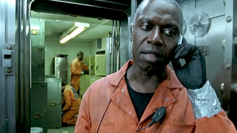 Andre Braugher talking on phone