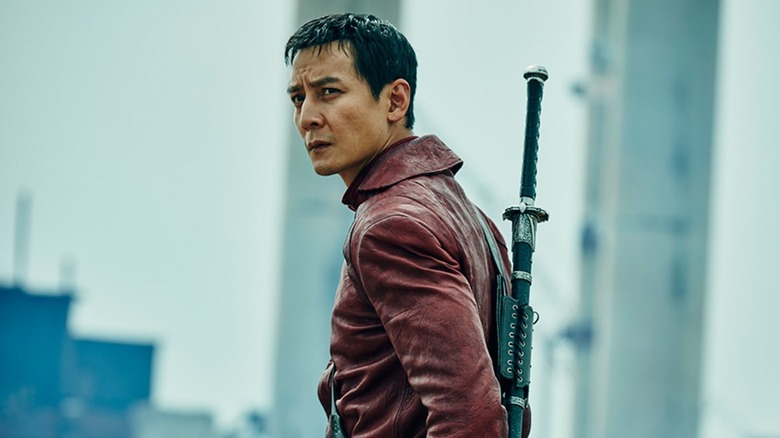 Hero stands with his sword